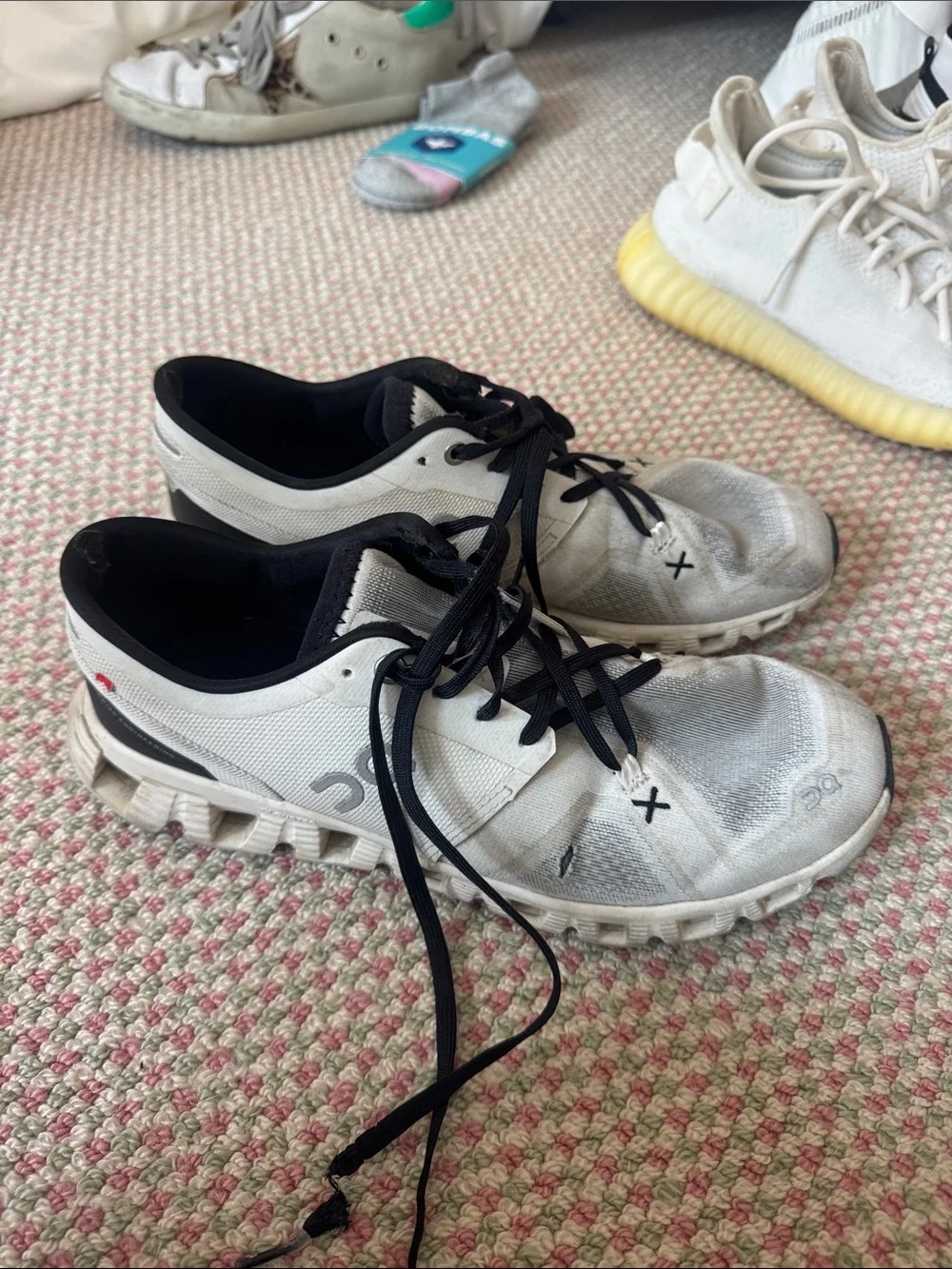 On Running White and Black Athletic Sneakers